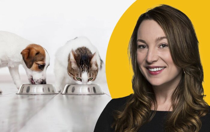 Portrait of Samantha Scantlebury along a puppy and cat eating out of stainless steel bowls.