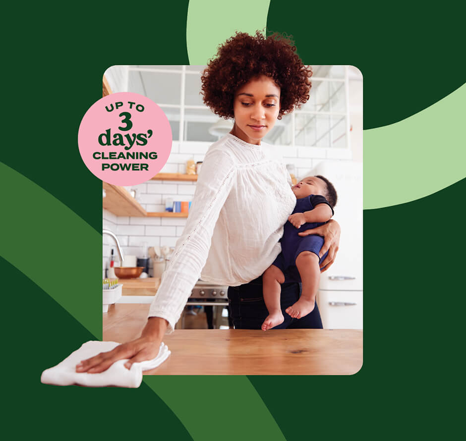 Up to 3 days cleaning power - plus photo of young woman cleaning a countertop while holding a baby