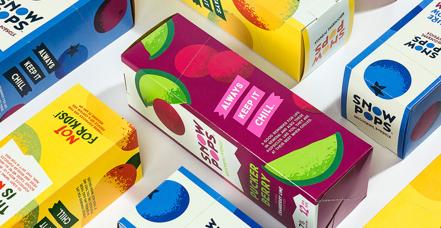 Array of many flavors of Snow Pops box packaging.